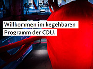 Bild des fedidwgugl-Haus der CDU mit dem Slogan "Willkommen im begehbaren Programm der CDU."